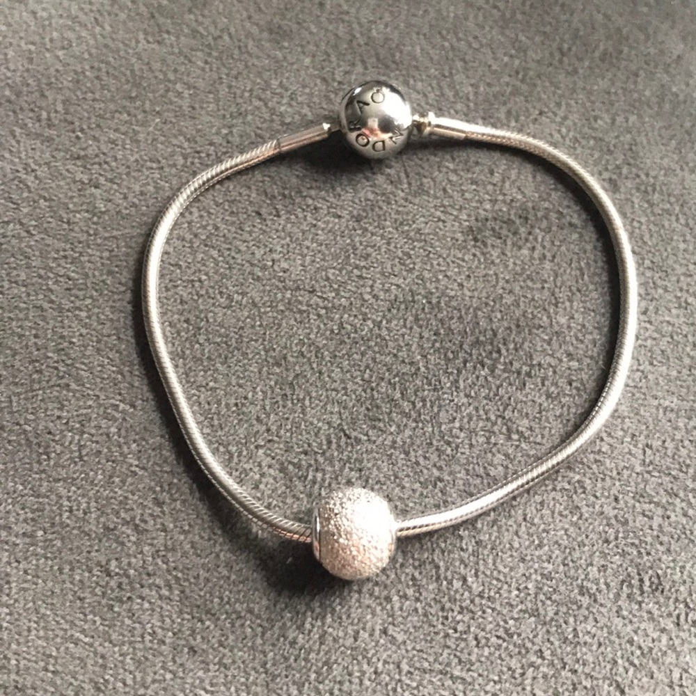 Pandora essence bracelet and wisdom charm